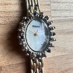 Dufonte ladies blue sapphires oval gold tone dress watch NEW BATTERY